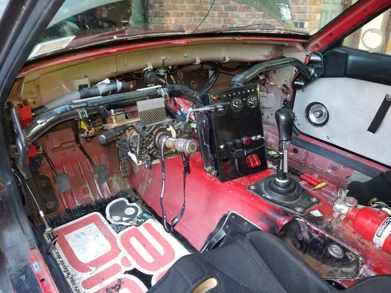 Some components, like the dash bar and the center console switch panel, were glitter powder coated to match the rear wing uprights and the valve cover. Fancy!